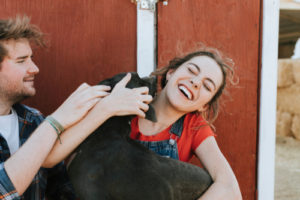 dog greeting owner